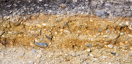Probing mineral-organic interfaces in soils and sediments using optical Photothermal infrared microscopy